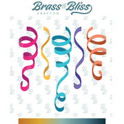 A collection of five streamer-shaped crafting dies in various colors, with the brand 'Brass & Bliss Craft Co.' displayed across the background.